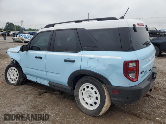 2024 Ford Bronco Sport Heritage z VIN 3FMCR9G60RRF28499, wystawiony jako Copart lot #59155805 z przebiegiem 1 451 mil mil oraz Czysty tytuł • Clean title. Historia ofert i sprzedaży dostępna na DreamBid. Obrazek 2.