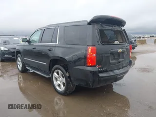 2015 Chevrolet Tahoe LT with VIN 1GNSCBKC2FR632139, listed as a IAAI auction lot 41553087 with 142,775 mi miles and . Bid and sale history available at DreamBid. Image 3.