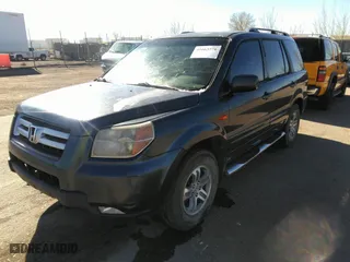 2006 Honda Pilot EX-L with VIN 2HKYF18586H514424, listed as a IAAI auction lot 41663778 with 210,020 mi miles. Bid and sale history available at carsss.com. Image 2.