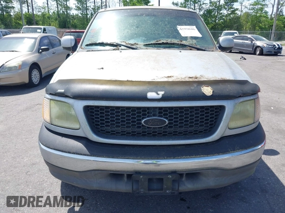 2002 Ford F-150 XL with VIN 1FTRX17W22NA55784, listed as a IAAI auction lot 41958686 with 278,064 mi miles. Bid and sale history available at carsss.com. Image 6.