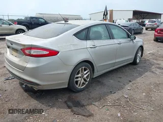 2014 Ford Fusion SE with VIN 1FA6P0H72E5404957, listed as a IAAI auction lot 42078932 with 262,429 mi miles. Bid and sale history available at carsss.com. Image 4.