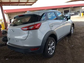 2019 Mazda CX-3 Sport with VIN JM1DKFB79K1400841, listed as a IAAI auction lot 41653084 with 77,210 mi miles. Bid and sale history available at carsss.com. Image 4.