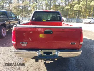 2000 Ford F-150 XL with VIN 1FTRX17L7YKA59717, listed as a IAAI auction lot 40887691 with 104,095 mi miles. Bid and sale history available at carsss.com. Image 16.