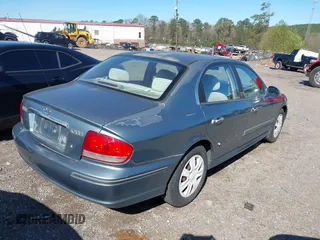 2004 Hyundai Sonata with VIN KMHWF25S74A048301, listed as a IAAI auction lot 41790506 with 179,740 mi miles. Bid and sale history available at carsss.com. Image 4.