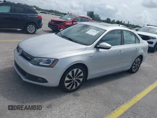 2013 Volkswagen Jetta Hybrid SEL with VIN 3VW637AJ2DM233265, listed as a IAAI auction lot 42746158 with 105,779 mi miles and . Bid and sale history available at DreamBid. Image 2.