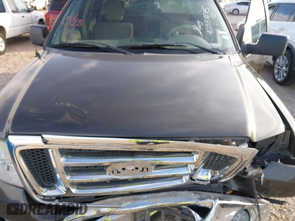2007 Ford F-150 XLT with VIN 1FTRW02W07KC31390, listed as a IAAI auction lot 42337875 with 158,701 mi miles and . Bid and sale history available at DreamBid. Image 10.
