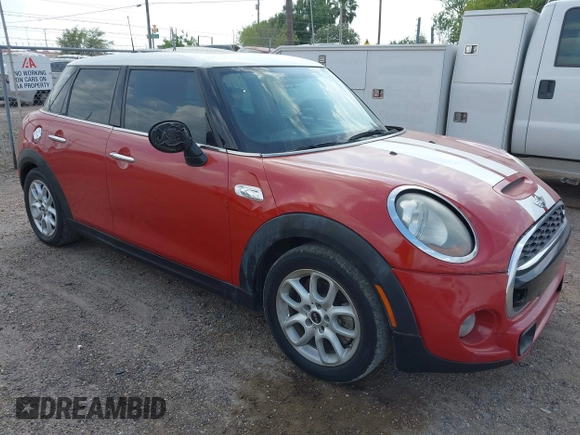 2016 MINI Cooper Hardtop 4 Door S with VIN WMWXU3C56G2D30140, listed as a IAAI auction lot 41883406 with 120,705 mi miles. Bid and sale history available at carsss.com. Image 1.