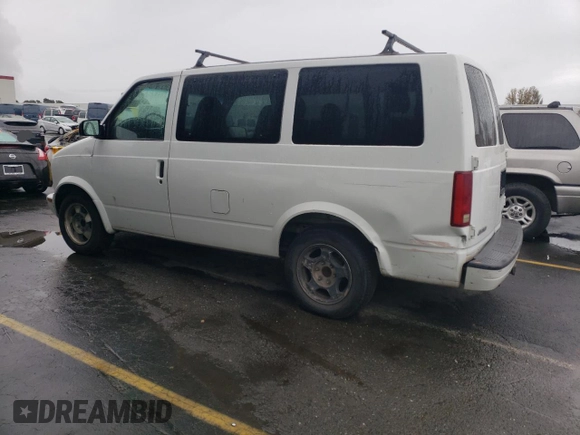 2003 Chevrolet Astro with VIN 1GNDM19XX3B123705, listed as a Copart auction lot 82614064 with 223,905 mi miles and Salvage Title. Bid and sale history available at DreamBid. Image 2.