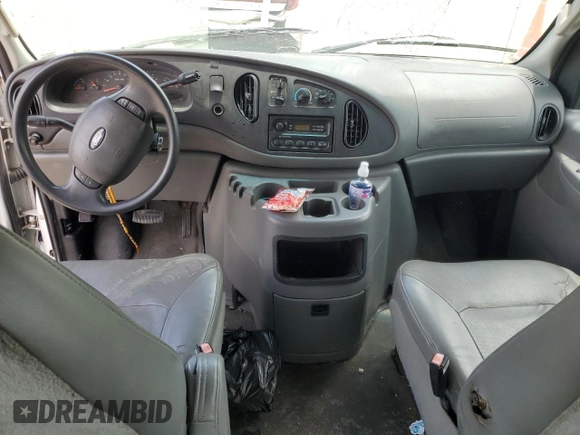 2004 Ford Econoline Passenger XL with VIN 1FBSS31L04HB37562, listed as a Copart auction lot 60328625 with 130,252 mi miles and Salvage title. Bid and sale history available at DreamBid. Image 8.