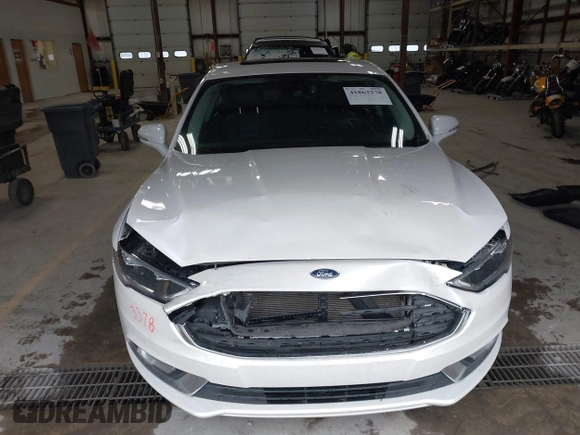 2018 Ford Fusion Titanium with VIN 3FA6P0RU1JR185937, listed as a IAAI auction lot 41863378 with 133,641 mi miles and . Bid and sale history available at DreamBid. Image 13.