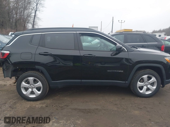 2018 Jeep Compass Altitude with VIN 3C4NJDBB0JT399781, listed as a IAAI auction lot 41711499 with 39,891 mi miles and . Bid and sale history available at carsss.com. Image 13.