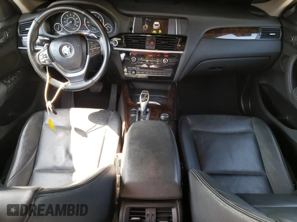 2015 BMW X4 xDrive28i with VIN 5UXXW3C57F0M88277, listed as a Copart auction lot 61388634 with 110,962 mi miles and Salvage title. Bid and sale history available at DreamBid. Image 8.