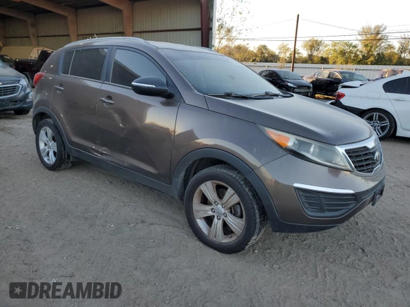 2013 Kia Sportage LX z VIN KNDPB3A23D7465413, wystawiony jako Copart lot #79964134 z przebiegiem 122 467 mil mil oraz Szkoda całkowita • Salvage title. Historia ofert i sprzedaży dostępna na DreamBid. Obrazek 4.