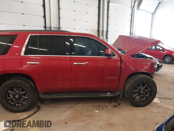 2015 Chevrolet Tahoe LT with VIN 1GNSKBKC9FR224692, listed as a IAAI auction lot 41922047 with 138,816 mi miles and . Bid and sale history available at DreamBid. Image 14.