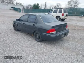 2003 Mitsubishi Lancer ES with VIN JA3AJ26E83U015342, listed as a IAAI auction lot 41819617 with 355,658 mi miles. Bid and sale history available at carsss.com. Image 3.