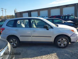 2014 Subaru Forester 2.5i with VIN JF2SJAAC4EG414600, listed as a IAAI auction lot 41006289 with 128,611 mi miles. Bid and sale history available at carsss.com. Image 13.
