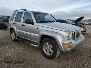 2004 Jeep Liberty Limited with VIN 1J4GK58K04W324655, listed as a Copart auction lot 84969204 with 151,994 mi miles and Salvage title. Bid and sale history available at DreamBid. Image 4.