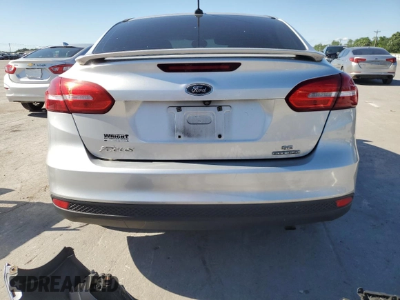 2015 Ford Focus SE z VIN 1FADP3F25FL283595, wystawiony jako Copart lot #57966705 z przebiegiem 182 405 mil mil oraz Szkoda całkowita • Salvage title. Historia ofert i sprzedaży dostępna na DreamBid. Obrazek 6.