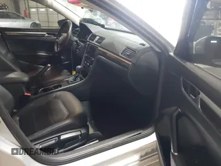 2016 Volkswagen Passat SE z VIN 1VWBT7A37GC027073, wystawiony jako IAAI lot #41073634 z przebiegiem 72 563 mil mil oraz . Historia ofert i sprzedaży dostępna na DreamBid. Obrazek 5.