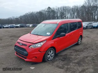2016 Ford Transit Connect Wagon XLT with VIN NM0GE9F79G1237595, listed as a IAAI auction lot 41718482 with 999,999 mi miles. Bid and sale history available at carsss.com. Image 2.