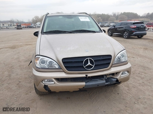 2002 Mercedes-Benz M-Class with VIN 4JGAB54E82A308902, listed as a IAAI auction lot 41779482 with 99,933 mi miles. Bid and sale history available at carsss.com. Image 6.