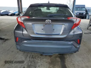 2019 Toyota C-HR XLE z VIN JTNKHMBX9K1026091, wystawiony jako Copart lot #50811835 z przebiegiem 86 424 mil mil oraz Szkoda całkowita • Salvage title. Historia ofert i sprzedaży dostępna na DreamBid. Obrazek 6.