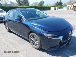 2024 Mazda 3 S with VIN 3MZBPAAMXRM421243, listed as a IAAI auction lot 41997588 with 10,099 mi miles and . Bid and sale history available at DreamBid. Image 1.