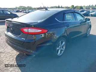2015 Ford Fusion SE with VIN 3FA6P0H99FR226772, listed as a IAAI auction lot 42185071 with 99,993 mi miles. Bid and sale history available at carsss.com. Image 4.