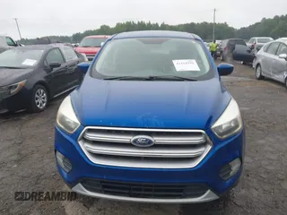 2017 Ford Escape SE z VIN 1FMCU0GD0HUD03757, wystawiony jako IAAI lot #42410990 z przebiegiem 188 884 mil mil oraz . Historia ofert i sprzedaży dostępna na DreamBid. Obrazek 6.