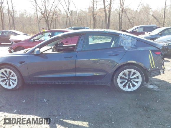 2022 Tesla Model 3 Long Range with VIN 5YJ3E1EB0NF365284, listed as a IAAI auction lot 41899706 with 36,463 mi miles and . Bid and sale history available at DreamBid. Image 15.