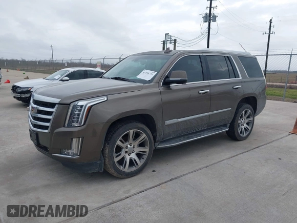 2015 Cadillac Escalade Luxury z VIN 1GYS3MKJ9FR725818, wystawiony jako IAAI lot #41596731 z przebiegiem 224 246 mil mil oraz . Historia ofert i sprzedaży dostępna na DreamBid. Obrazek 2.