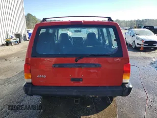 1999 Jeep Cherokee SE with VIN 1J4FT28S6XL515896, listed as a Copart auction lot 83745444 with 192,406 mi miles and Salvage title. Bid and sale history available at DreamBid. Image 6.