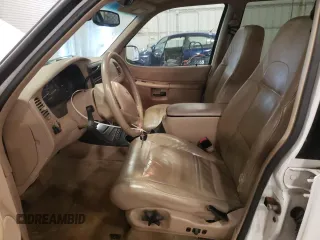 2000 Ford Explorer Eddie Bauer z VIN 1FMDU84P0YZC67167, wystawiony jako Copart lot #85806684 z przebiegiem 156 411 mil mil oraz Szkoda całkowita • Salvage title. Historia ofert i sprzedaży dostępna na DreamBid. Obrazek 7.