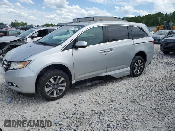 2015 Honda Odyssey Touring Elite z VIN 5FNRL5H93FB041067, wystawiony jako Copart lot #58329355 z przebiegiem 72 000 mil mil oraz Szkoda całkowita • Salvage title. Historia ofert i sprzedaży dostępna na DreamBid. Obrazek 1.