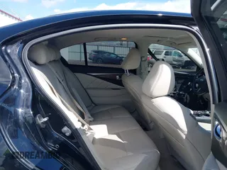 2014 Infiniti Q50 Hybrid Premium with VIN JN1AV7AP8EM691436, listed as a IAAI auction lot 42138263 with 93,253 mi miles and . Bid and sale history available at DreamBid. Image 8.