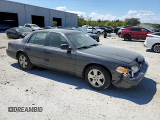 2004 Ford Crown Victoria LX z VIN 2FAFP74W44X112942, wystawiony jako Copart lot #50484665 z przebiegiem 248 480 mil mil oraz Szkoda całkowita • Salvage title. Historia ofert i sprzedaży dostępna na DreamBid. Obrazek 4.