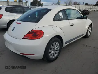 2013 Volkswagen Beetle Entry with VIN 3VWFP7AT5DM654385, listed as a Copart auction lot 48741515 with 47,029 mi miles and Salvage Title. Bid and sale history available at DreamBid. Image 3.