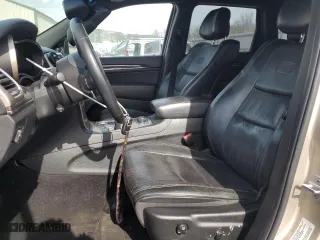 2014 Jeep Grand Cherokee Overland with VIN 1C4RJFCT1EC164988, listed as a Copart auction lot 47444065 with 151,409 mi miles and Salvage Title. Bid and sale history available at carsss.com. Image 7.