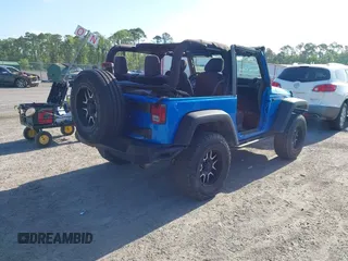2015 Jeep Wrangler Sport z VIN 1C4AJWAG8FL550859, wystawiony jako IAAI lot #42154946 z przebiegiem 143 658 mil mil oraz . Historia ofert i sprzedaży dostępna na DreamBid. Obrazek 4.