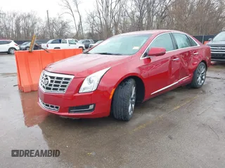 2013 Cadillac XTS z VIN 2G61N5S36D9129188, wystawiony jako IAAI lot #41824147 z przebiegiem 80 985 mil mil oraz . Historia ofert i sprzedaży dostępna na DreamBid. Obrazek 2.