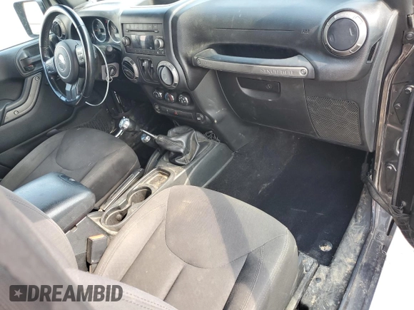 2017 Jeep Wrangler Sport with VIN 1C4AJWAG9HL721332, listed as a Copart auction lot 63459185 with 143,608 mi miles and Salvage title. Bid and sale history available at DreamBid. Image 8.