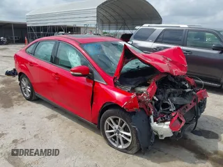 2015 Ford Focus SE z VIN 1FADP3F23FL233620, wystawiony jako IAAI lot #42073204 z przebiegiem 129 109 mil mil oraz . Historia ofert i sprzedaży dostępna na DreamBid. Obrazek 1.