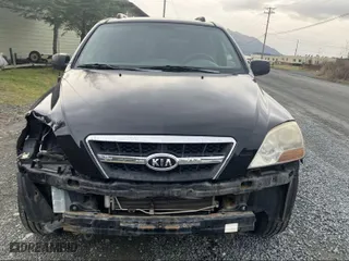 2009 Kia Sorento LX with VIN KNDJD735095890122, listed as a IAAI auction lot 41049479 with 153,333 mi miles. Bid and sale history available at carsss.com. Image 6.
