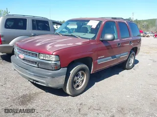 2002 Chevrolet Tahoe LT with VIN 1GNEC13Z22R284959, listed as a IAAI auction lot 41803861 with 278,795 mi miles. Bid and sale history available at carsss.com. Image 2.