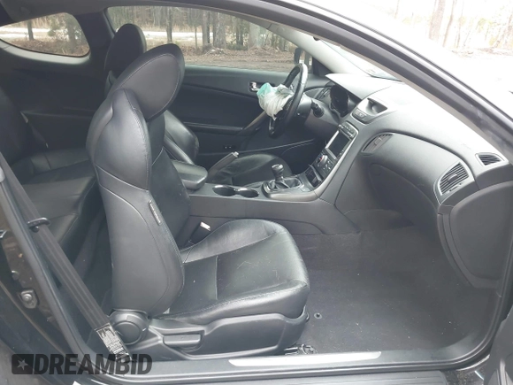 2012 Hyundai Genesis Coupe Grand Touring z VIN KMHHU6KH3CU068055, wystawiony jako IAAI lot #41359683 z przebiegiem 114 423 mil mil oraz . Historia ofert i sprzedaży dostępna na DreamBid. Obrazek 5.