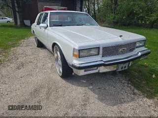 1989 Chevrolet Caprice z VIN 1G1BU51E8KA111809, wystawiony jako IAAI lot #42298235 z przebiegiem 89 139 mil mil oraz . Historia ofert i sprzedaży dostępna na DreamBid. Obrazek 1.