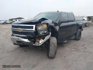 2014 Chevrolet Silverado 1500 LT with VIN 3GCUKREH4EG427604, listed as a IAAI auction lot 41403243 with 133,467 mi miles. Bid and sale history available at carsss.com. Image 6.