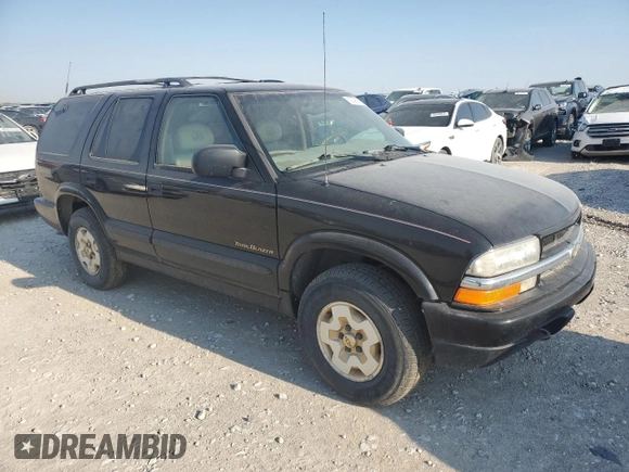 1999 Chevrolet Blazer Trailblazer z VIN 1GNDT13W2X2130625, wystawiony jako Copart lot #50596885 z przebiegiem 187 444 mil mil oraz Czysty tytuł • Clean title. Historia ofert i sprzedaży dostępna na DreamBid. Obrazek 4.