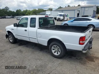 2011 Ford Ranger XL with VIN 1FTKR1ED6BPA27455, listed as a Copart auction lot 58354945 with 263,663 mi miles and Salvage title. Bid and sale history available at DreamBid. Image 2.