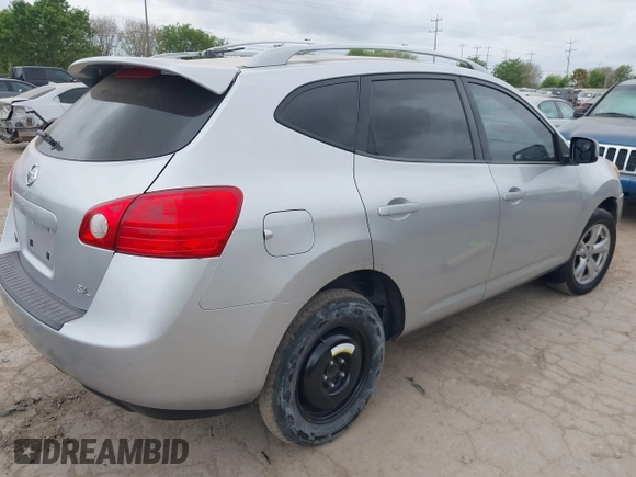 2009 Nissan Rogue SL with VIN JN8AS58T09W320539, listed as a IAAI auction lot 41870913 with 210,432 mi miles and . Bid and sale history available at DreamBid. Image 4.
